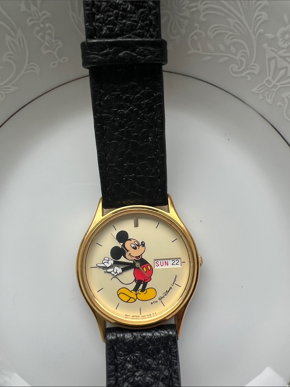 Seiko Gold Tone Watch with Black Strap and Cream Dial